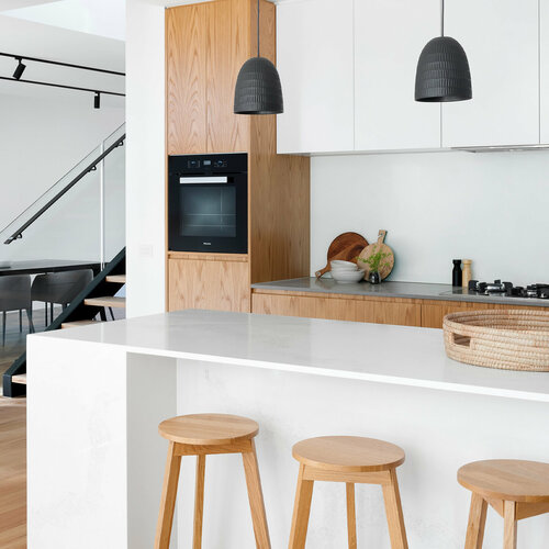 Image shows a kitchen where SÜDPACK Compounds were processed through extrusion, injection molding, and thermoforming.